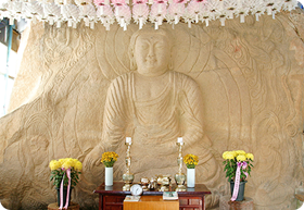 Rock-carved Seated Buddha at Bungmireugam Hermitage of Daeheungsa Temple, Haenam
